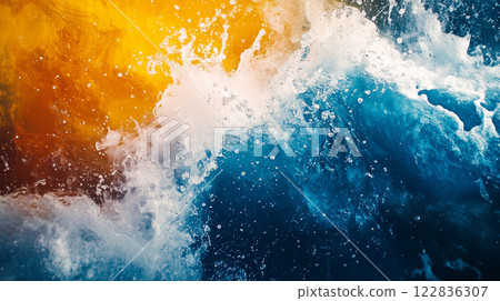 Splash of water with a splash of orange and yellow. The splash of orange and yellow is in the middle of the splash of water, creating a vibrant and dynamic scene Splash of water with a splash of orange and yellow. The splash of orange and yellow is in the middle of the splash of water, creating a vibrant and dynamic scene 122836307