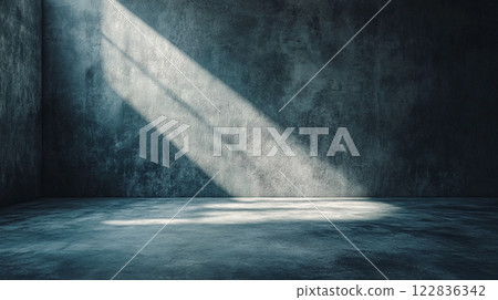 Large room with a wall that is covered in concrete. The room is empty and has a very industrial feel Large room with a wall that is covered in concrete. The room is empty and has a very industrial feel 122836342