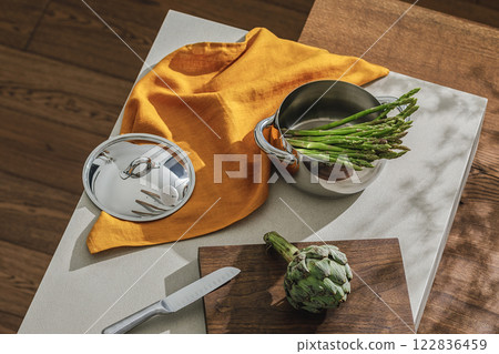 Assortment of fresh vegetables, linen towels and stainless still kitchen appliances. Healthy food cooking ingredients background with fresh vegetables Assortment of fresh vegetables, linen towels and stainless still kitchen appliances. Healthy food cooking ingredients background with fresh vegetables 122836459