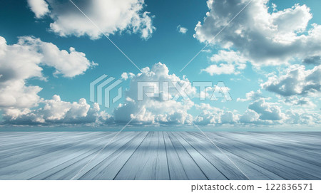 Clear blue sky with a few clouds and a wooden floor. The sky is calm and peaceful, and the wooden floor gives a sense of warmth and coziness Clear blue sky with a few clouds and a wooden floor. The sky is calm and peaceful, and the wooden floor gives a sense of warmth and coziness 122836571