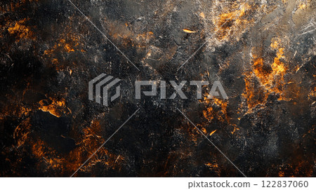 Dark background with a lot of orange fire and smoke. The fire is scattered throughout the scene, with some areas being more intense than others. The smoke is thick and billowing 122837060