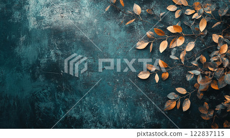 Leafy green background with a few leaves scattered around. The leaves are brown and the background is blue 122837115