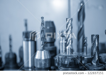 Close-up scene group of the used flat or square solid end mill tools. Close-up scene group of the used flat or square solid end mill tools. 122837151