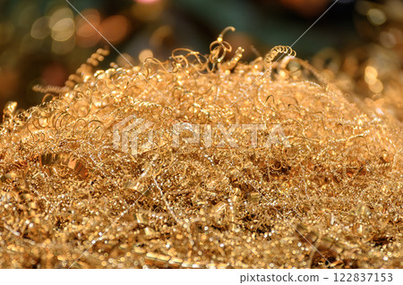 Close-up scene of the fine brass materials scrap from turning process. Close-up scene of the fine brass materials scrap from turning process. 122837153