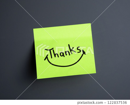 A vibrant sticky note expressing gratitude with a smiley design 122837536