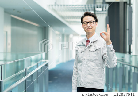 Male engineer working in an office [Filming cooperation: SKY Perfect Tokyo Media Center] 122837611