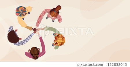 Top view of a diverse group of female colleagues in a circle hands stacked together as a symbol of agreement or unity.International women s day.DEIB or empowerment.Banner copy space 122838043