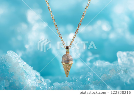 Elegant golden ice cream cone necklace on a light blue background. White gold ice cream cone jewelry pendant. Sweets and fast fashion concept. Rip diet, creative jewelry. Summer vibes, holidays. 122838216