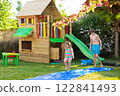 Kids playing in swimming pool 122841493