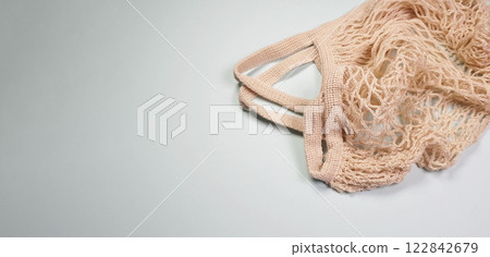Eco-friendly mesh shopping bag, rotating on white background, zero waste concept, ECO-friendly, reasonable consumption, 122842679