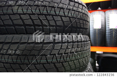 Variety Car Tires Stacked In Tire Storage. Seasonal Tire Storage Stock Image Variety Car Tires Stacked In Tire Storage. Seasonal Tire Storage Stock Image 122843156