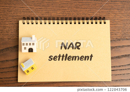 Nar settlement in real estate concept. Agreements addressing broker commissions, transparency, and potential reforms in the real estate industry. Notes and miniature houses 122843706