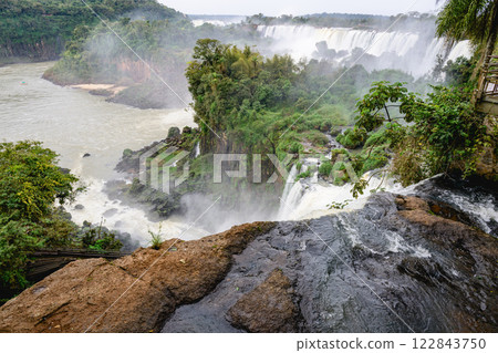 Iguazu waterfalls in overcast weather Iguazu waterfalls in overcast weather 122843750