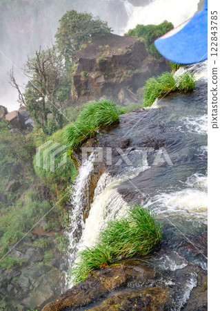 Iguazu waterfalls in overcast weather Iguazu waterfalls in overcast weather 122843785