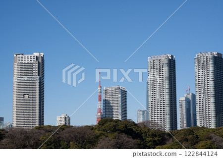 Tokyo Tower seen between the buildings Tokyo Tower seen between the buildings 122844124