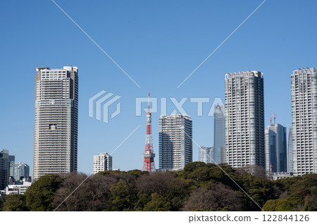 Tokyo Tower seen between the buildings Tokyo Tower seen between the buildings 122844126
