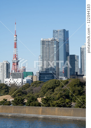 Sumida River and Tokyo Tower seen between the buildings Sumida River and Tokyo Tower seen between the buildings 122844183