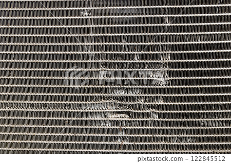 an old car radiator made of lead damaged after an accident 122845512
