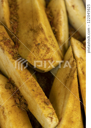 the flesh and seeds of sliced ripe eggplant 122845625