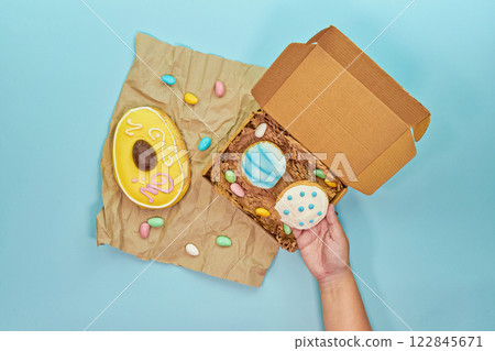 Maltese figolli biscuits showcase vibrant shape and sweet icing. Figolli evoking cherished heritage among pastry lovers. Figolli bridging maltese tradition and creative flair for festive gatherings 122845671