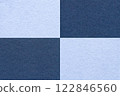 Texture craft navy blue and denim paper background with cells pattern, macro. Structure vintage kraft sky cardboard. 122846560
