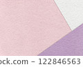 Texture of craft light pink color paper background with white and lilac border. Vintage abstract rose cardboard. 122846563