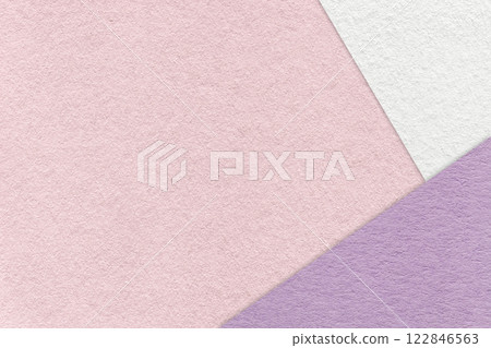 Texture of craft light pink color paper background with white and lilac border. Vintage abstract rose cardboard. 122846563
