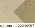 Texture beige paper background, half two colors with brown arrow, macro. Structure dense craft sand cardboard. 122846567