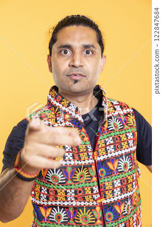 Angry man warning friend over debacle during bickering, isolated over studio background. Close up shot of annoyed person in disagreement with mate, pointing finger and lecturing him after altercation Angry man warning friend over debacle during bickering, isolated over studio background. Close up shot of annoyed person in disagreement with mate, pointing finger and lecturing him after altercation 122847684