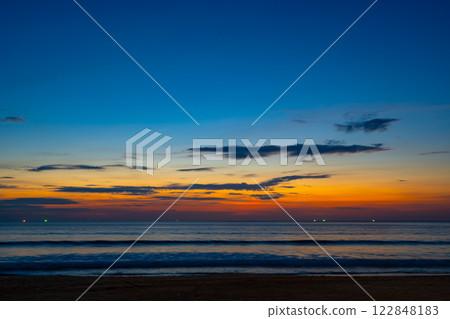 Landscape of colorful clouds in sunset or sunrise sky over sea with reflection in the tropical sea,Beautiful seascape scenery,Amazing light of nature Landscape nature background Landscape of colorful clouds in sunset or sunrise sky over sea with reflection in the tropical sea,Beautiful seascape scenery,Amazing light of nature Landscape nature background 122848183
