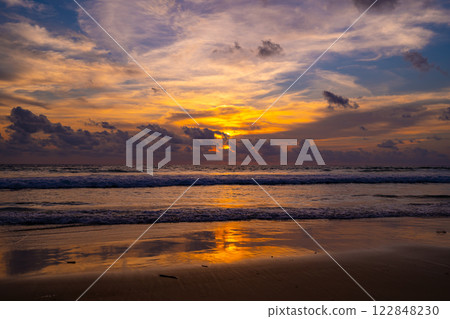Landscape of colorful clouds in sunset or sunrise sky over sea with reflection in the tropical sea,Beautiful seascape scenery,Amazing light of nature Landscape nature background Landscape of colorful clouds in sunset or sunrise sky over sea with reflection in the tropical sea,Beautiful seascape scenery,Amazing light of nature Landscape nature background 122848230