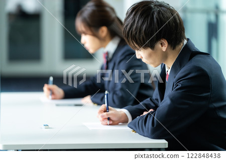 Students taking the exam 122848438