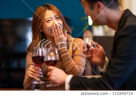Young woman serving at a high-class club Young woman serving at a high-class club 122848714