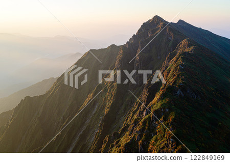 Sunrise seen from Mt. Ichinokura Mountain scenery of the Tanigawa mountain range 122849169