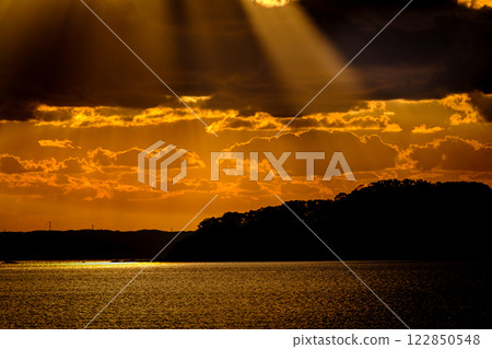 Sunset over the sea 122850548