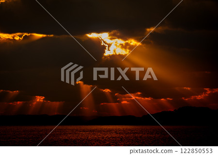 Sunset over the sea 122850553