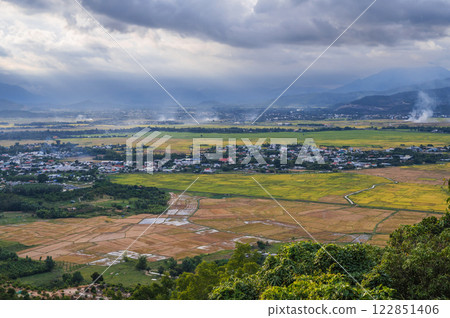 top view of rice fields with villages on background of mountains in Vietnam in Asia top view of rice fields with villages on background of mountains in Vietnam in Asia 122851406