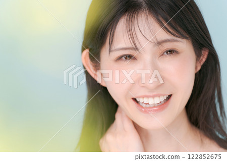 A woman checking her skin 122852675