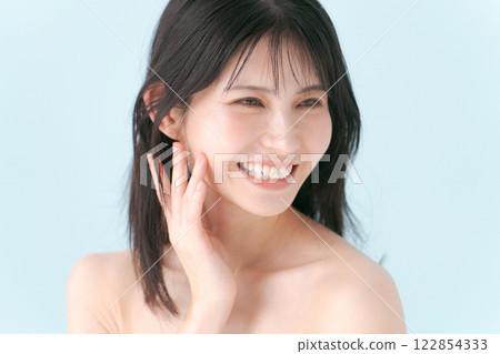 Beauty image of a smiling young woman Beauty image of a smiling young woman 122854333