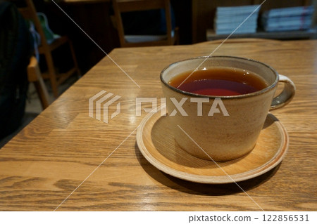 Tea on a cafe table Tea on a cafe table 122856531