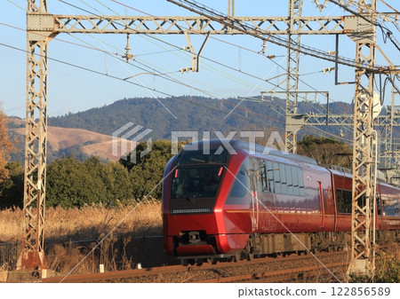 Hitotori limited express train on the Kintetsu Nara Line running through the World Heritage Heijo Palace ruins 122856589