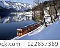 A train running on the Tadami Line in winter 122857389