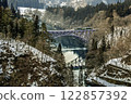A train going over a bridge over the Tadami River 122857392