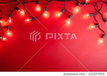 Bulb lights, red background. 122857859