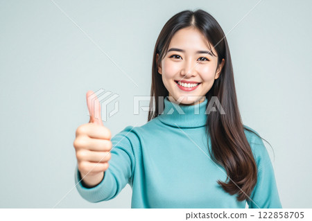 Female student reading, laughing, background dark color 122858705