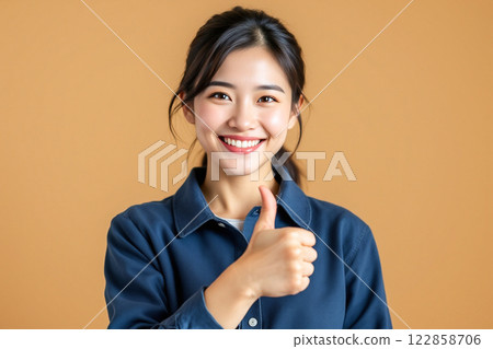 Female student reading, laughing, background dark color 122858706
