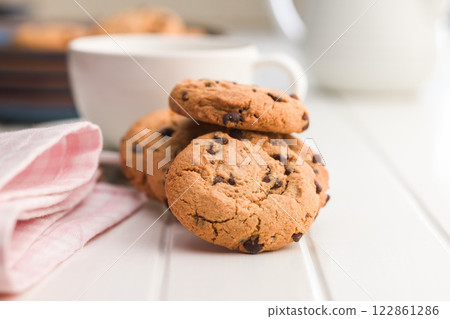 Chocolate chip cookies on white table. Chocolate chip cookies on white table. 122861286