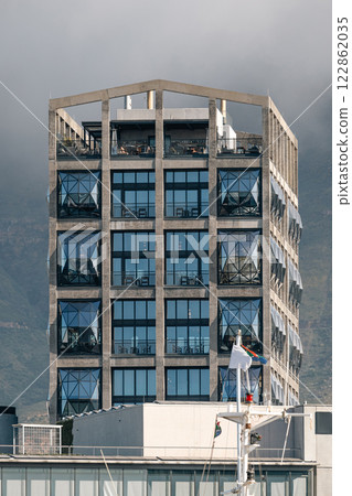 Contemporary, industrial style building, close-up shot upper levels 122862035