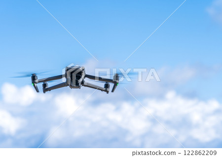 Drone flying blue sky 122862209