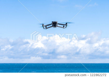 Drone flying on the shore 122862272
